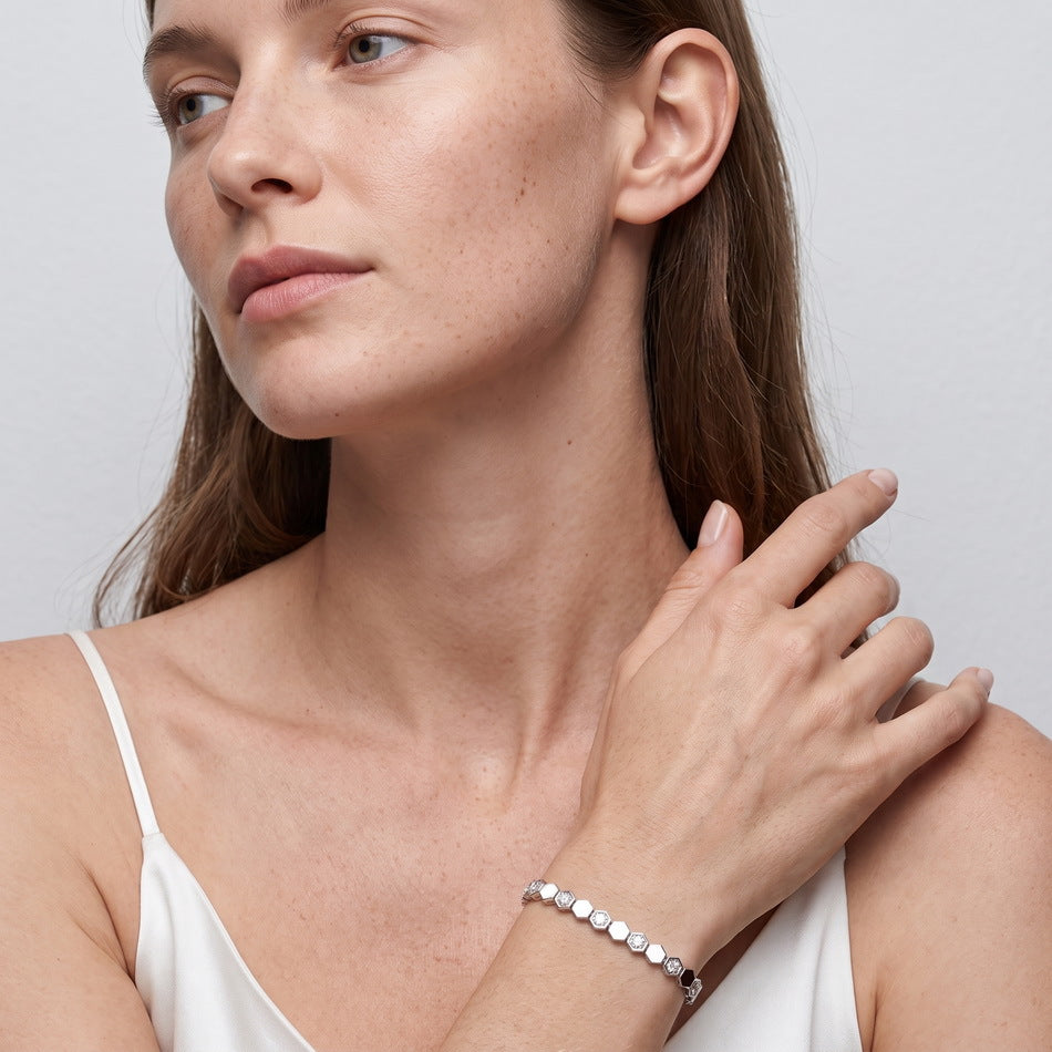 Model wearing the honeycomb tennis bracelet