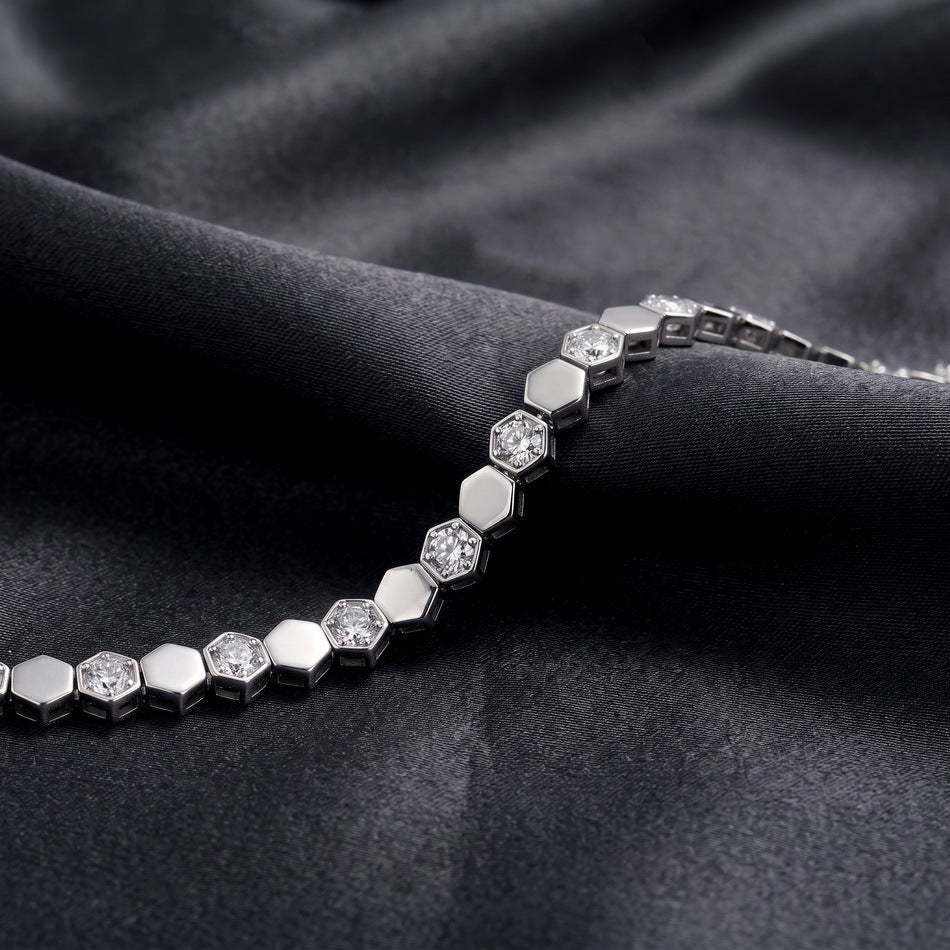 On dark satin, close up