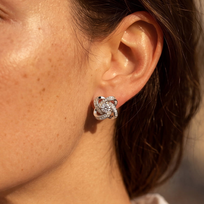 Model wearing the love knot studs