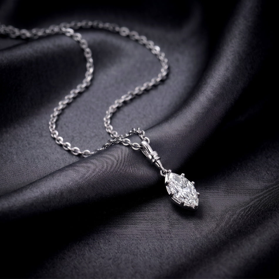 On dark satin, close up