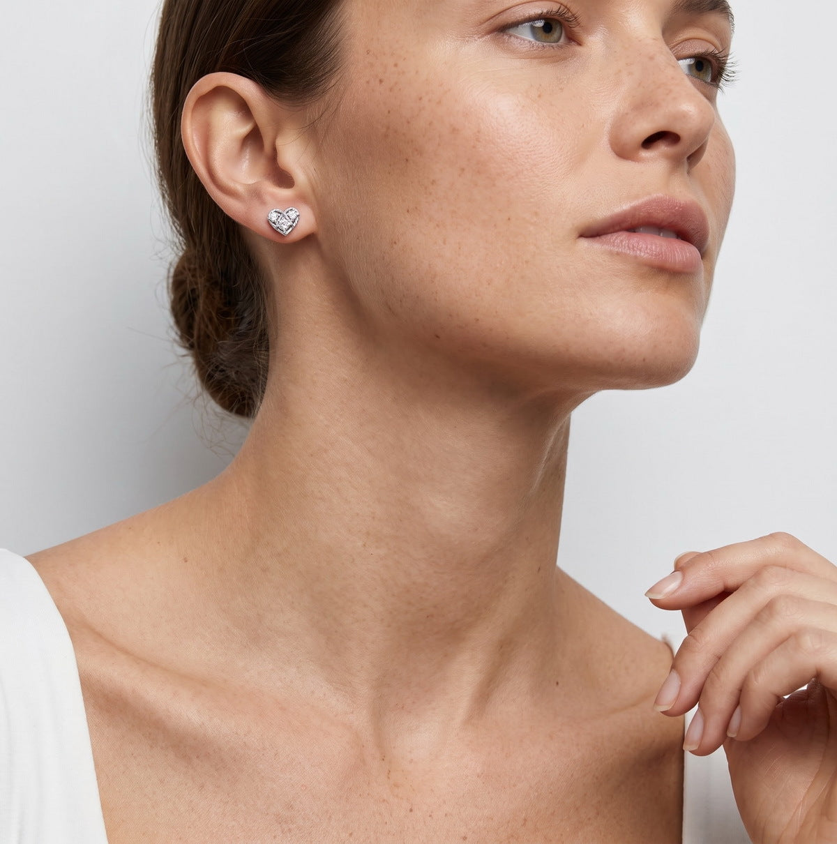Mini heart stud worn on the ear
