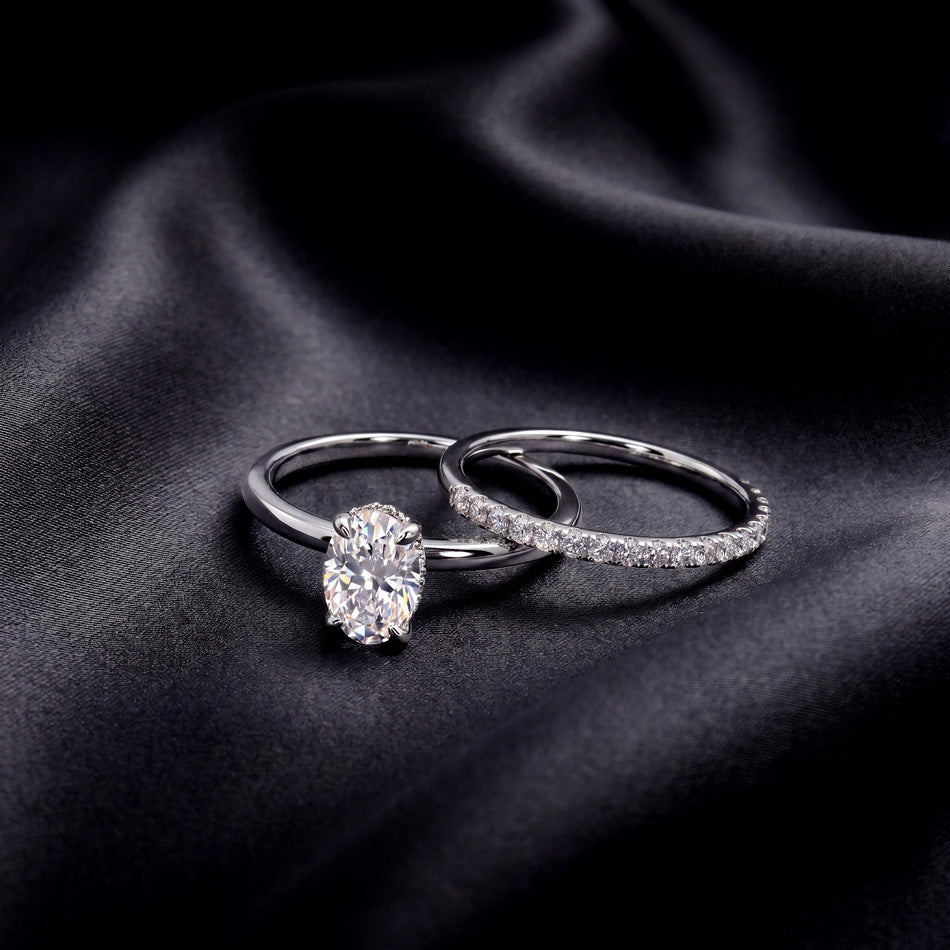 Both rings on dark satin