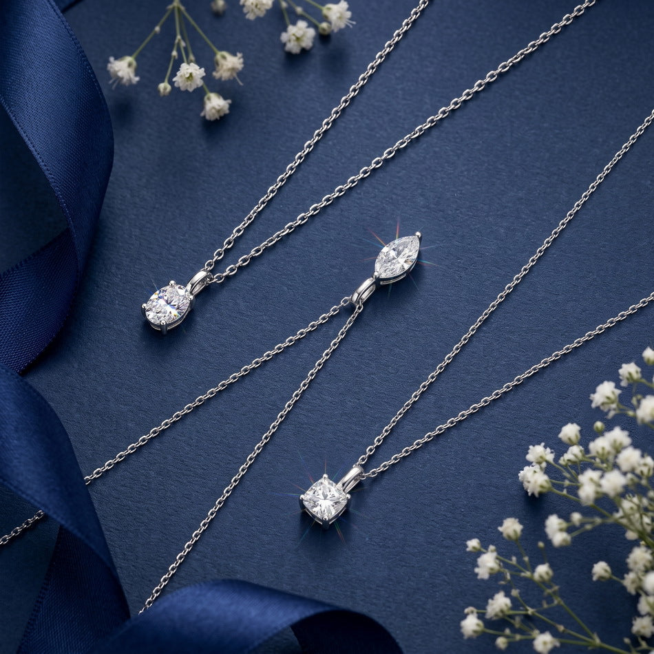 The three lab diamond pendants on navy