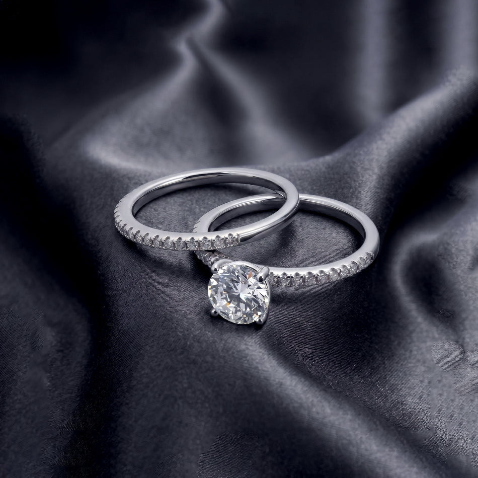 Both rings on dark satin