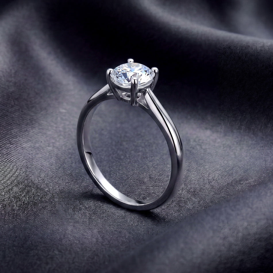 Lab diamond solitaire ring on dark silk