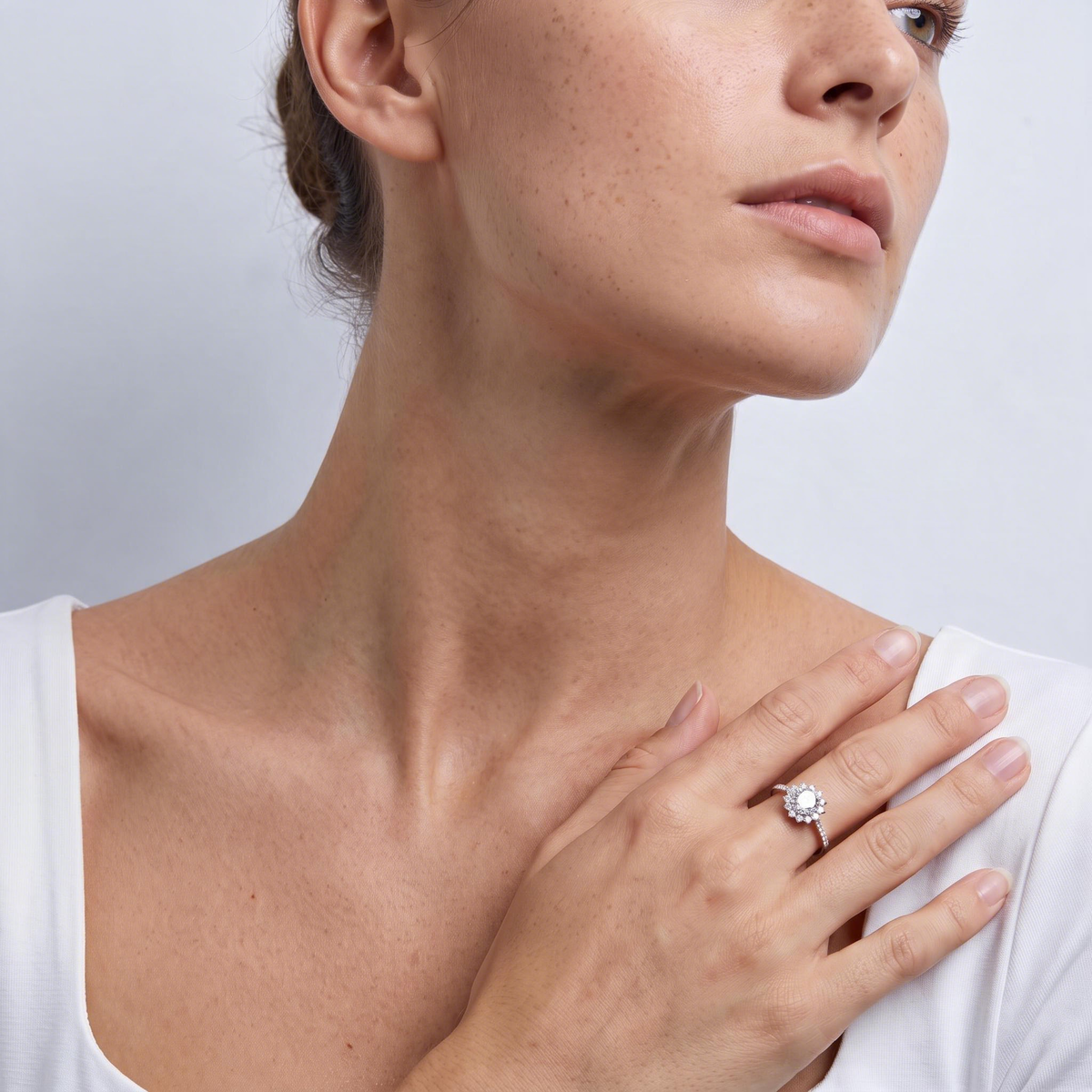 Model wearing the sunflower halo ring
