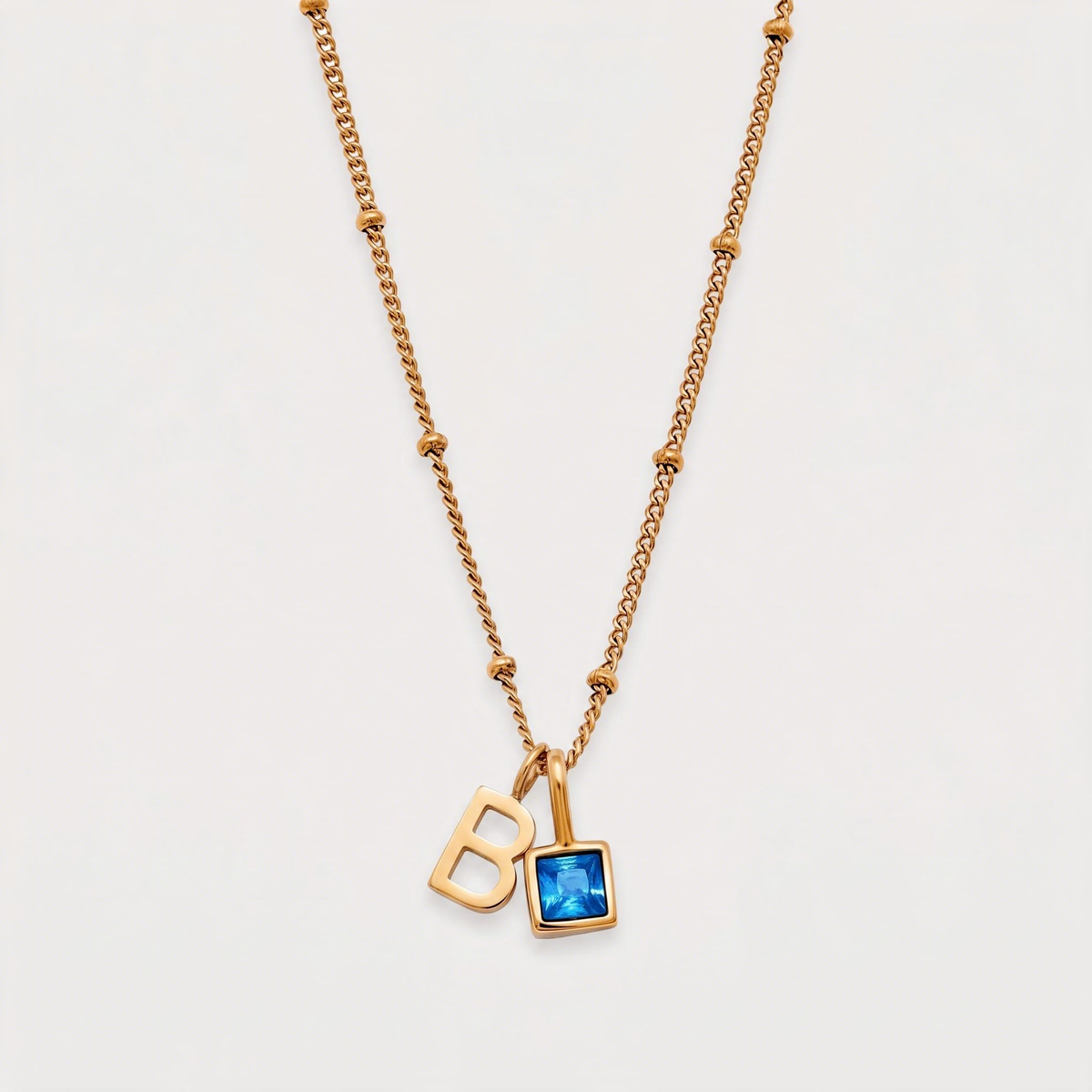 Letter B · gold
