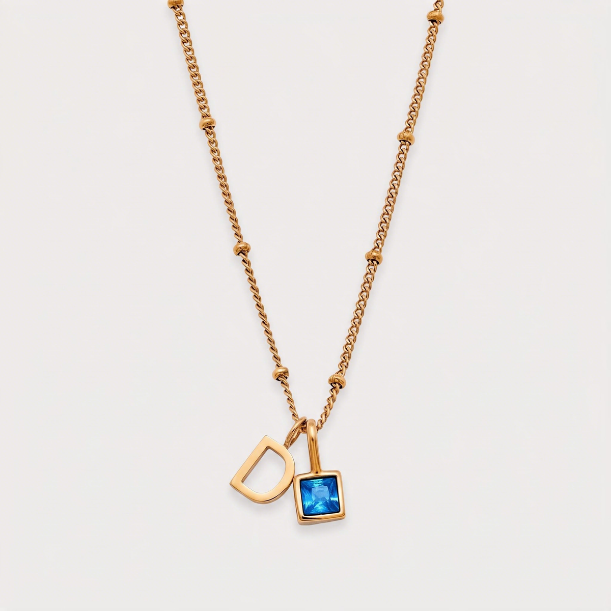 Letter D · gold