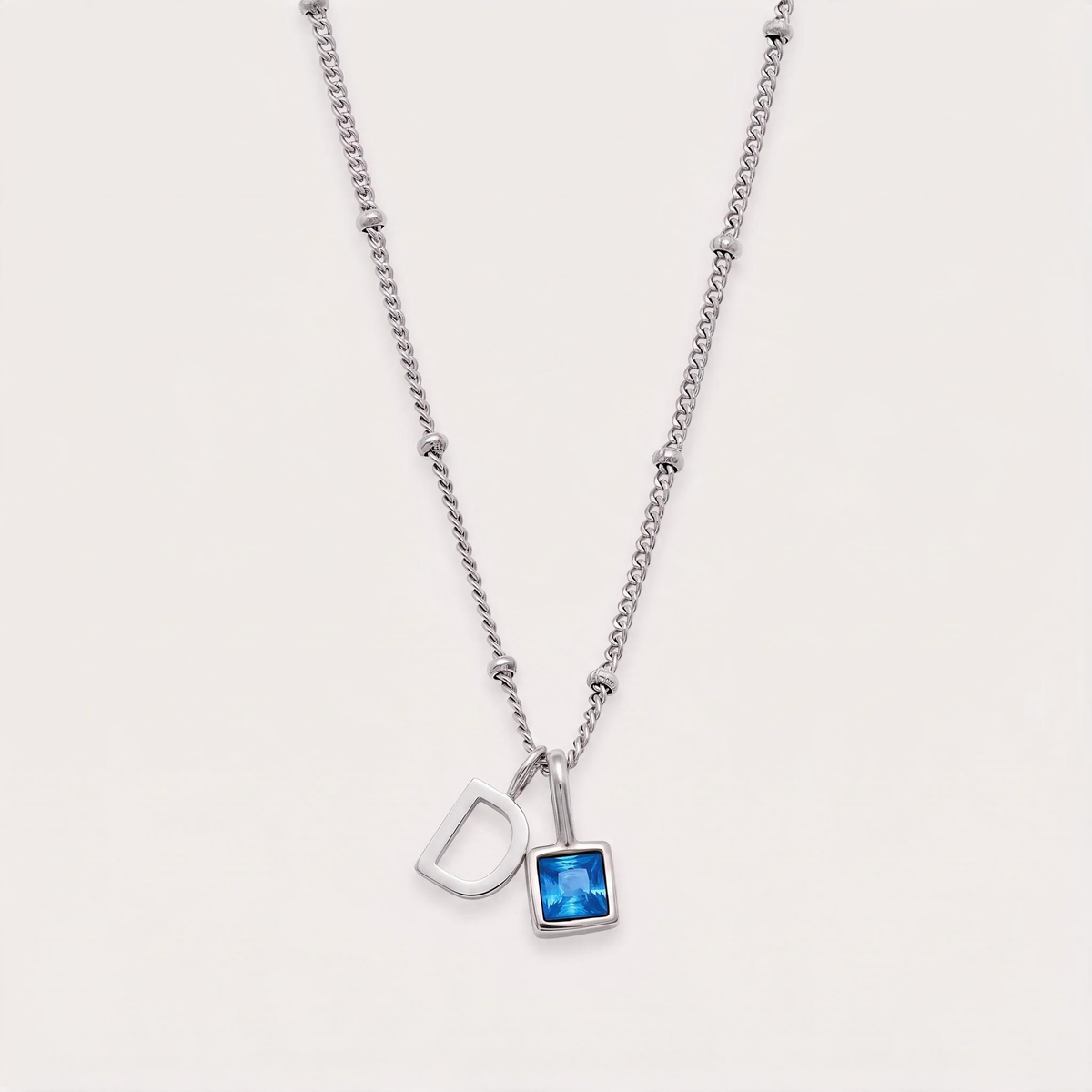 Letter D · silver
