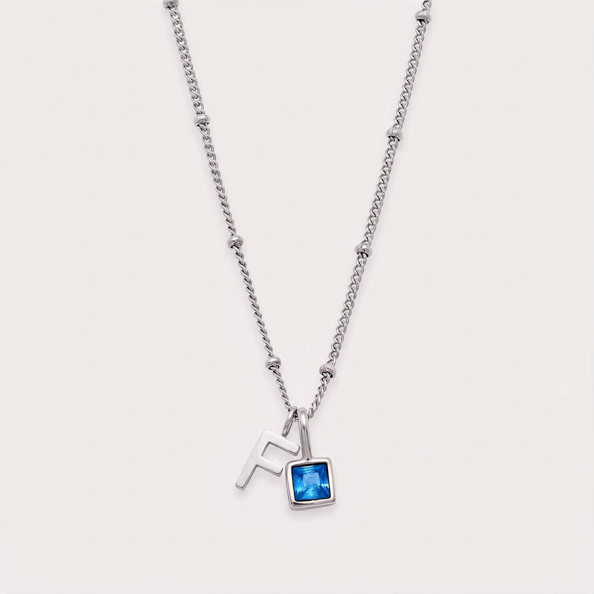 Letter F · silver