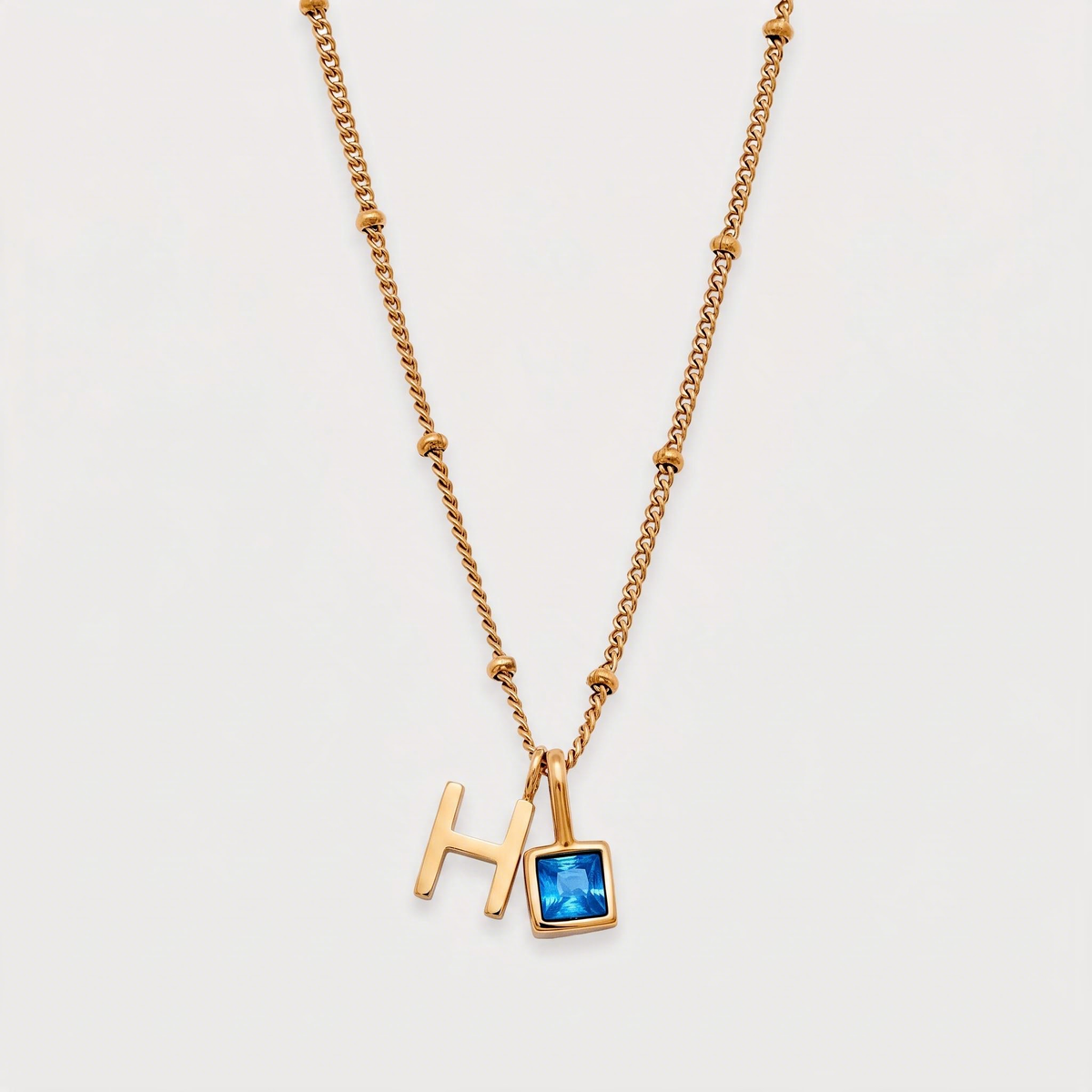 Letter H · gold