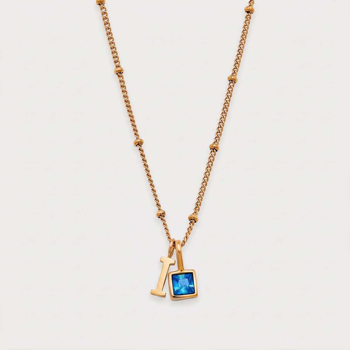 Letter I · gold