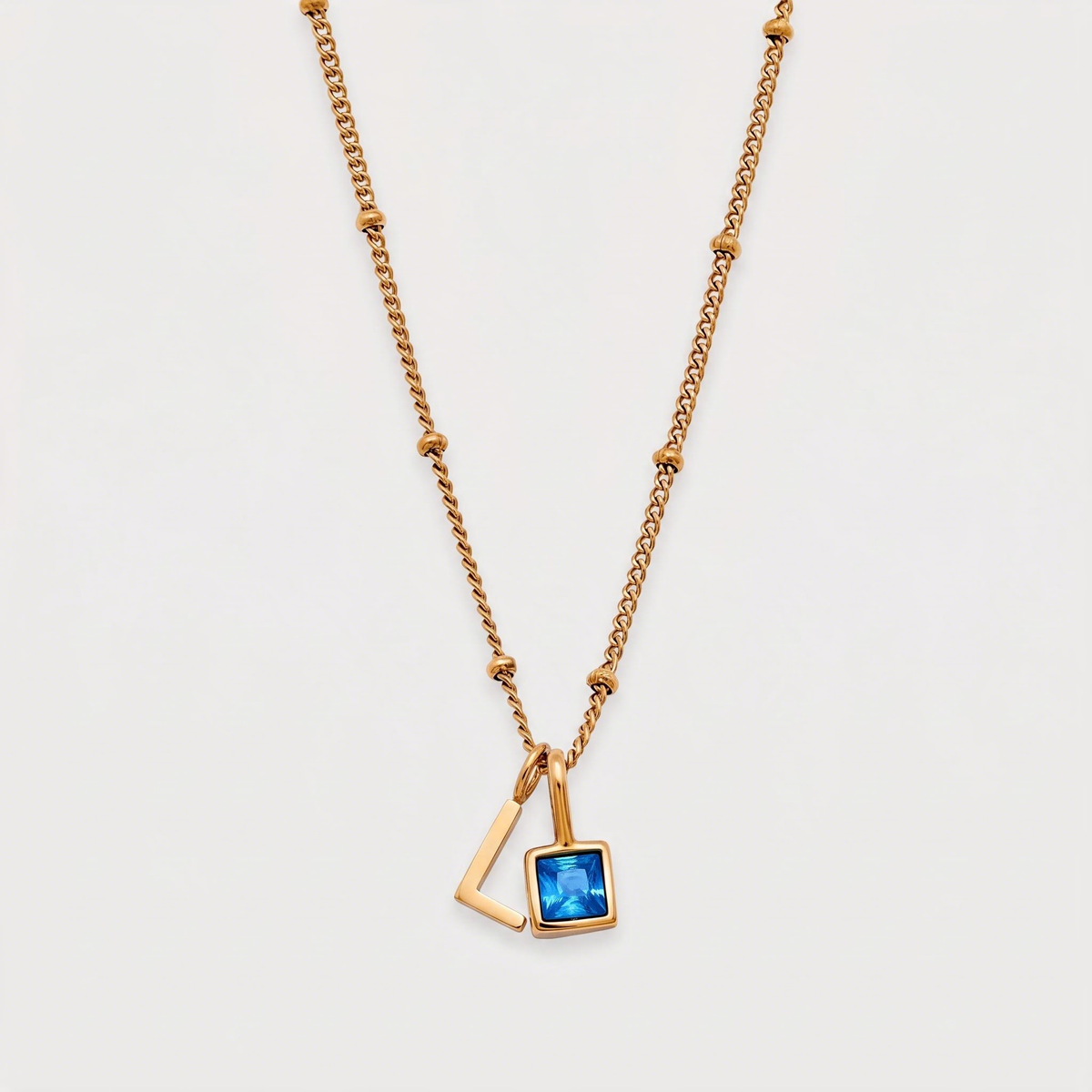 Letter L · gold