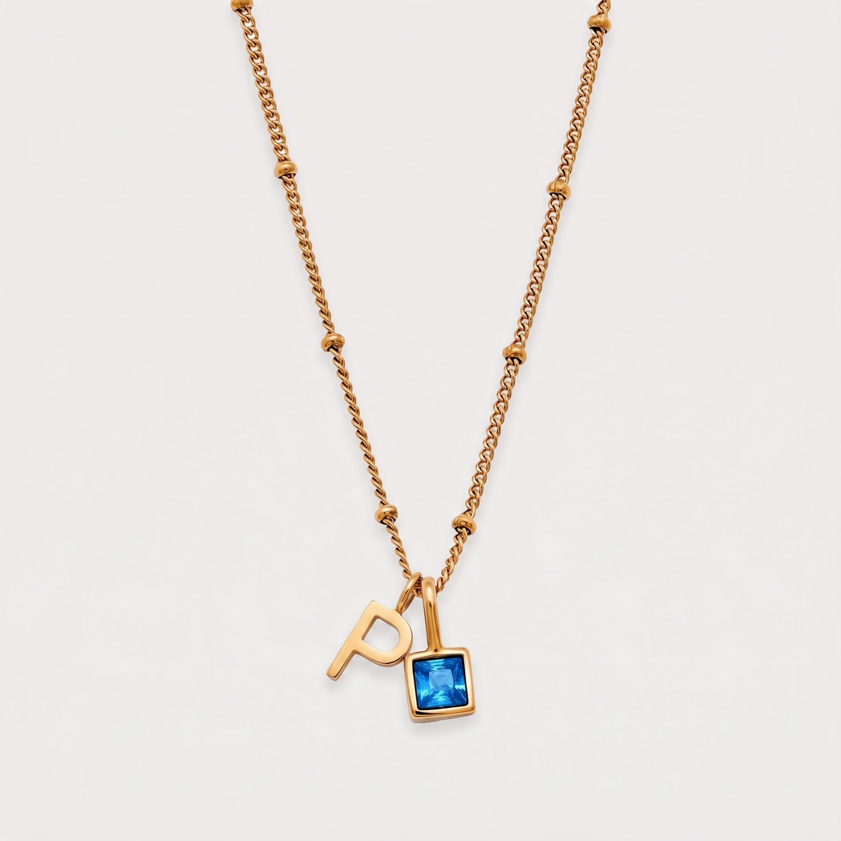 Letter P · gold
