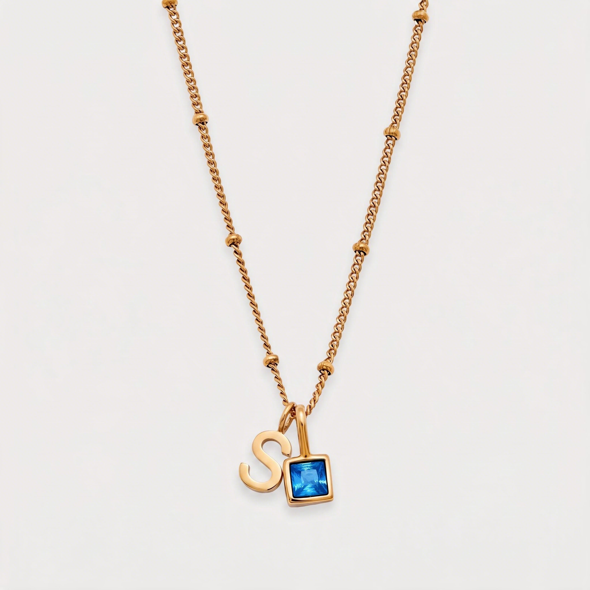 Letter S · gold