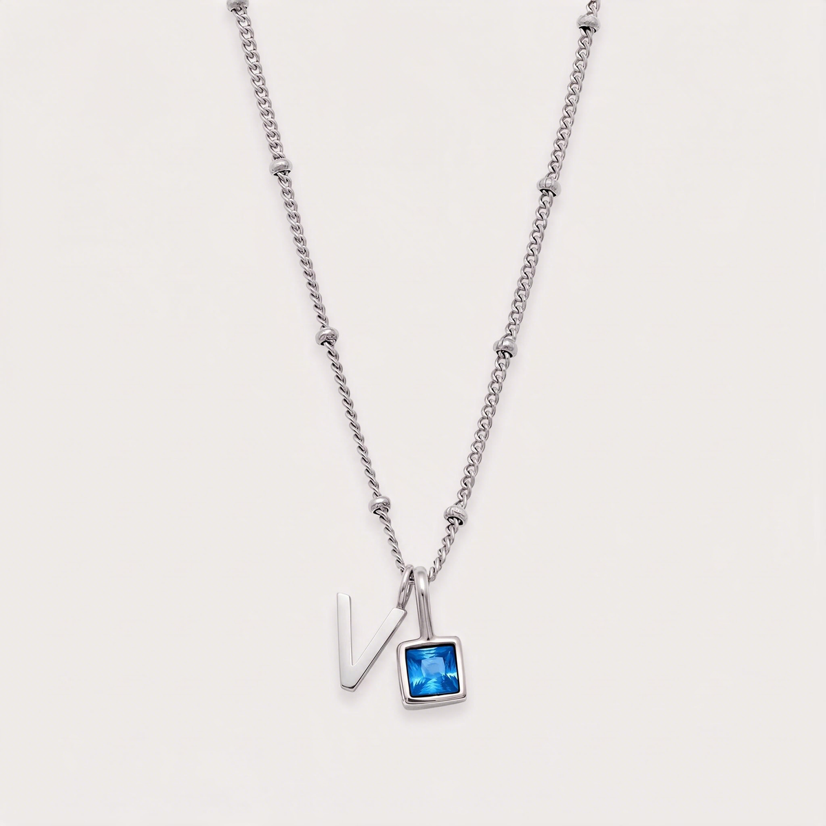 Letter V · silver
