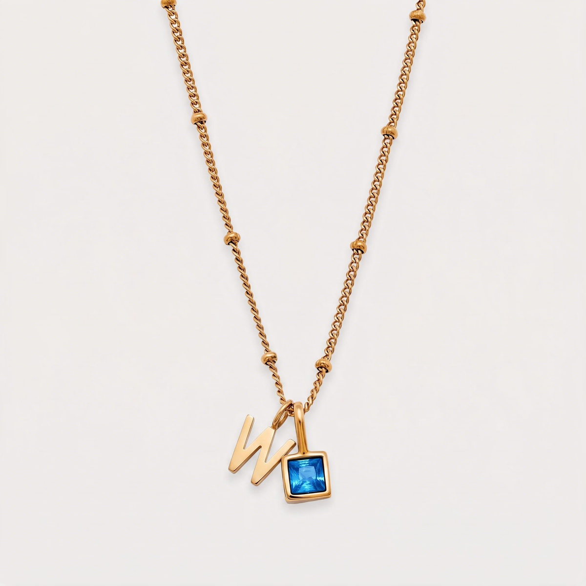 Letter W · gold