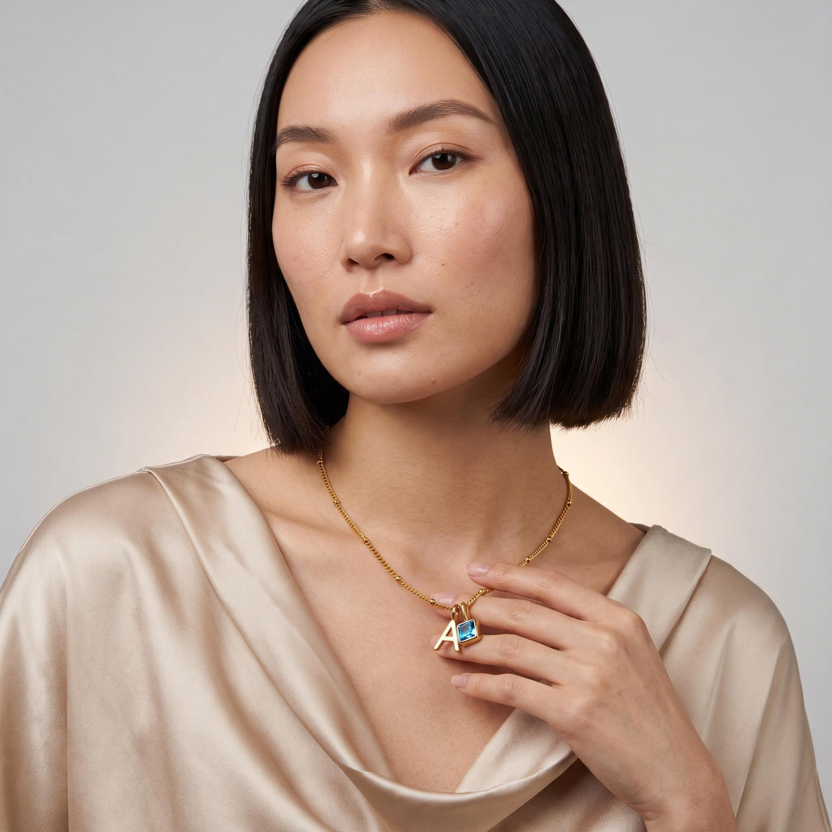 Letter Birthstone Necklace worn by a model