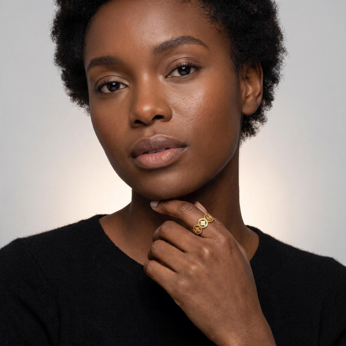 Medallion Chain Ring worn by a model