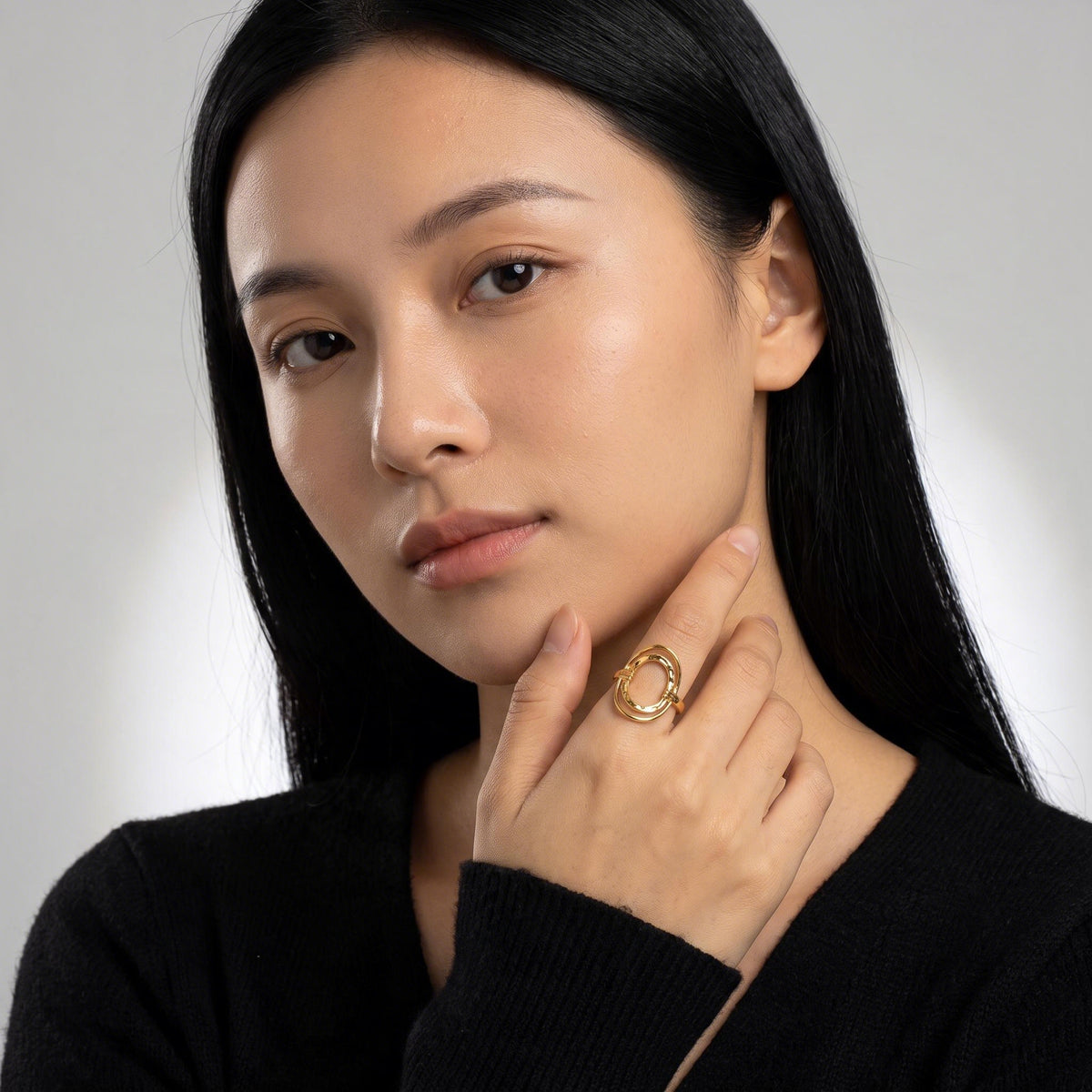 Oval Halo Ring worn by a model