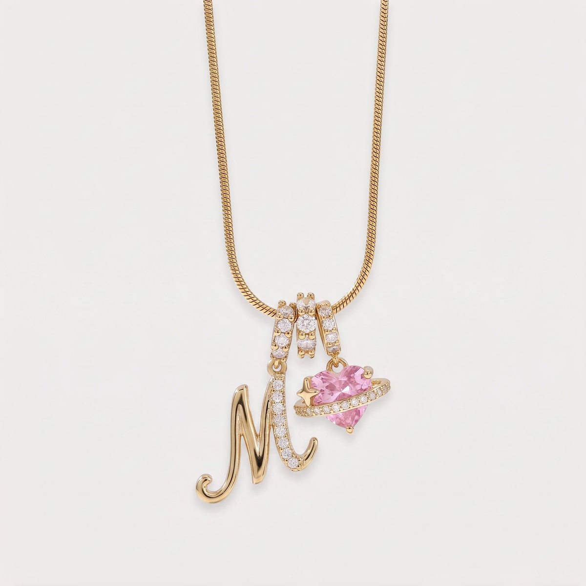 Letter M · gold
