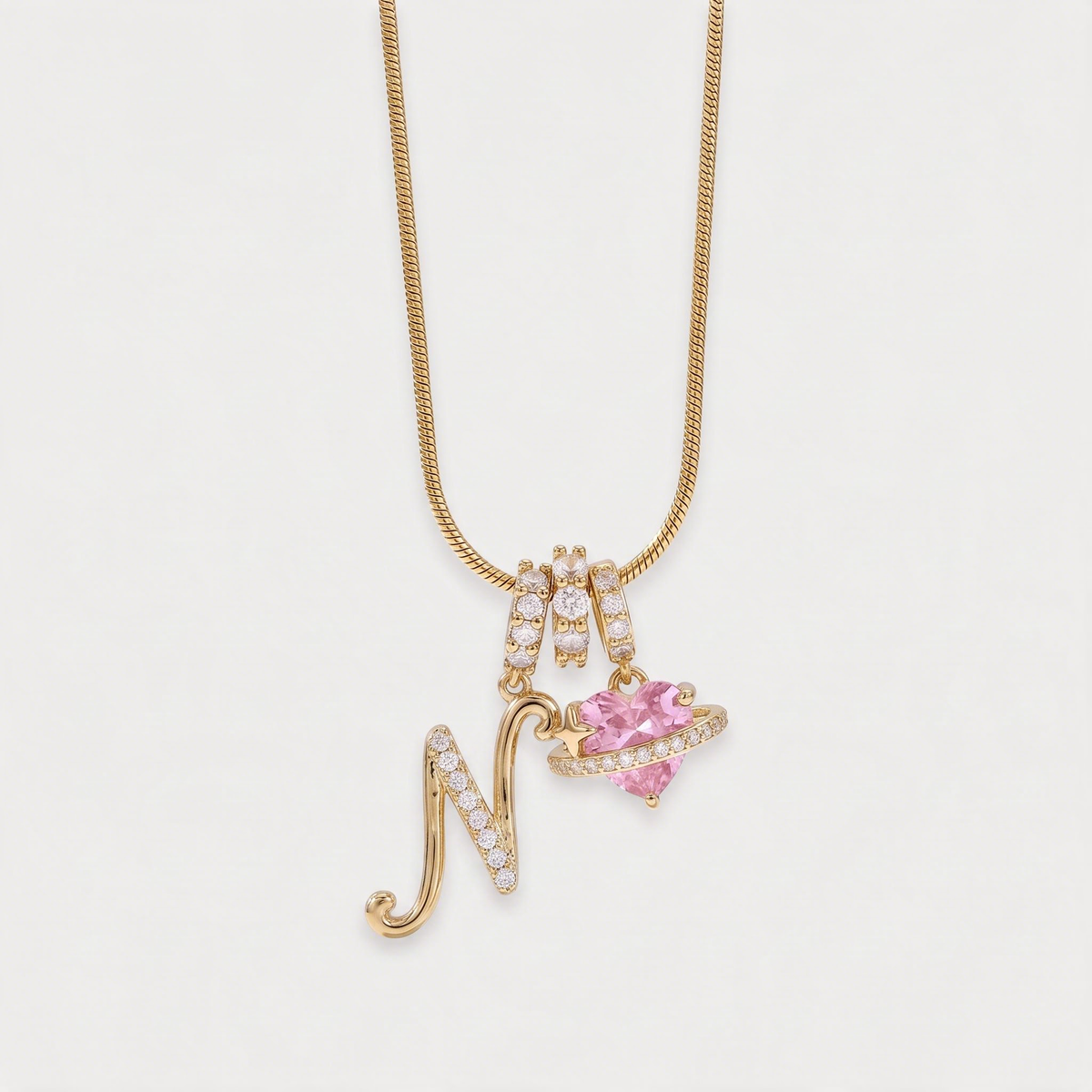Letter N · gold