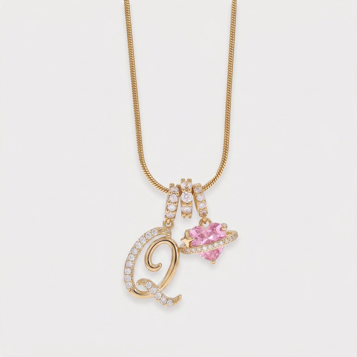 Letter Q · gold