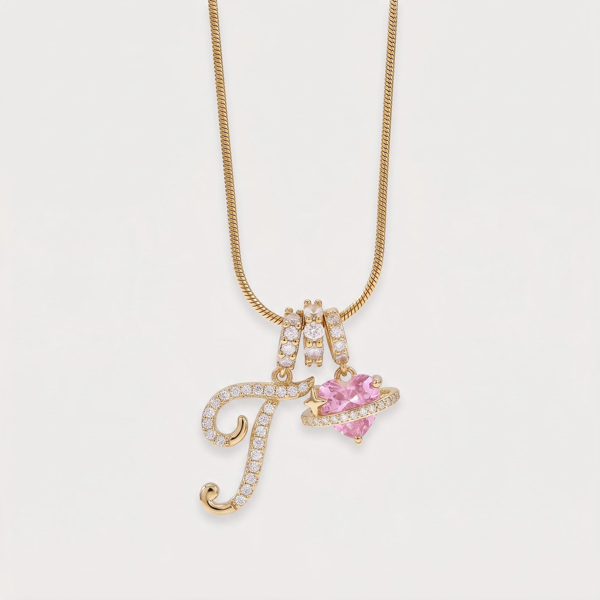 Letter T · gold
