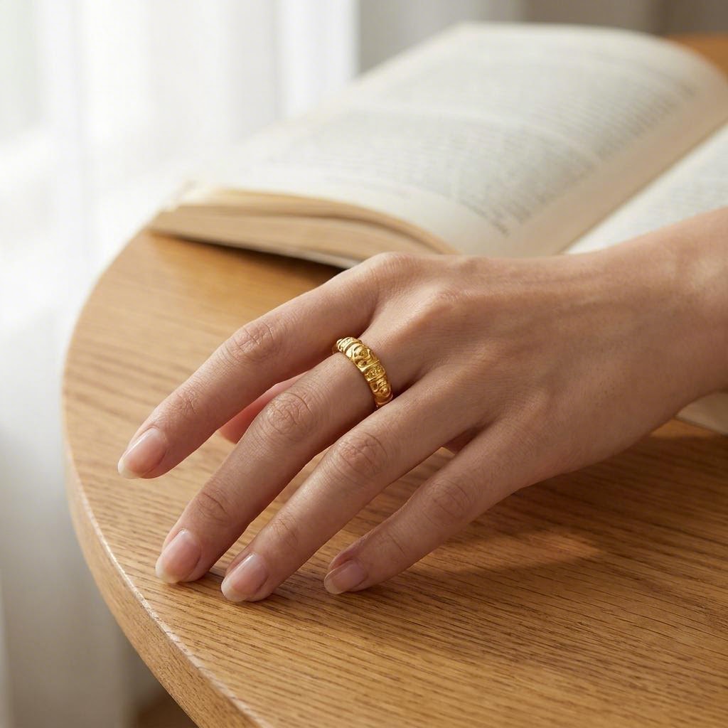 Swirl Relief Ring worn on the hand