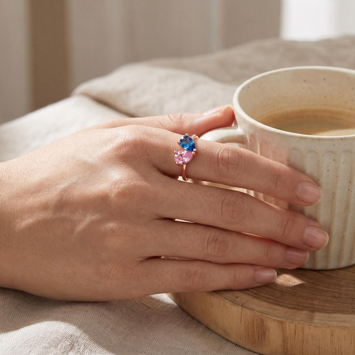 Rose gold together birthstone ring worn